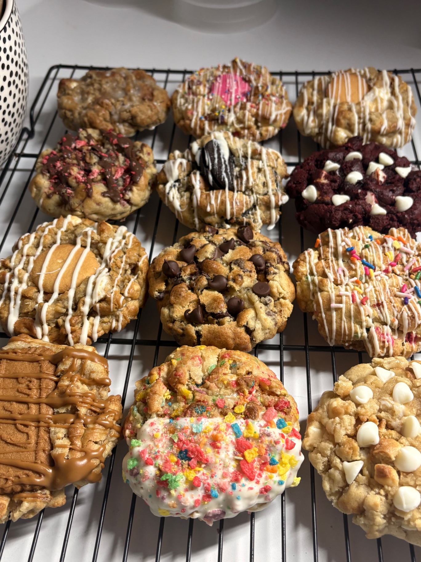 A collection of twelve decorated Reese Bake Co cookies
